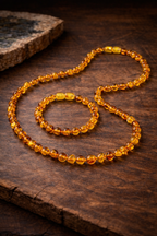 Coffret bébé - parure en ambre véritable - collier + bracelet - modèle 002N