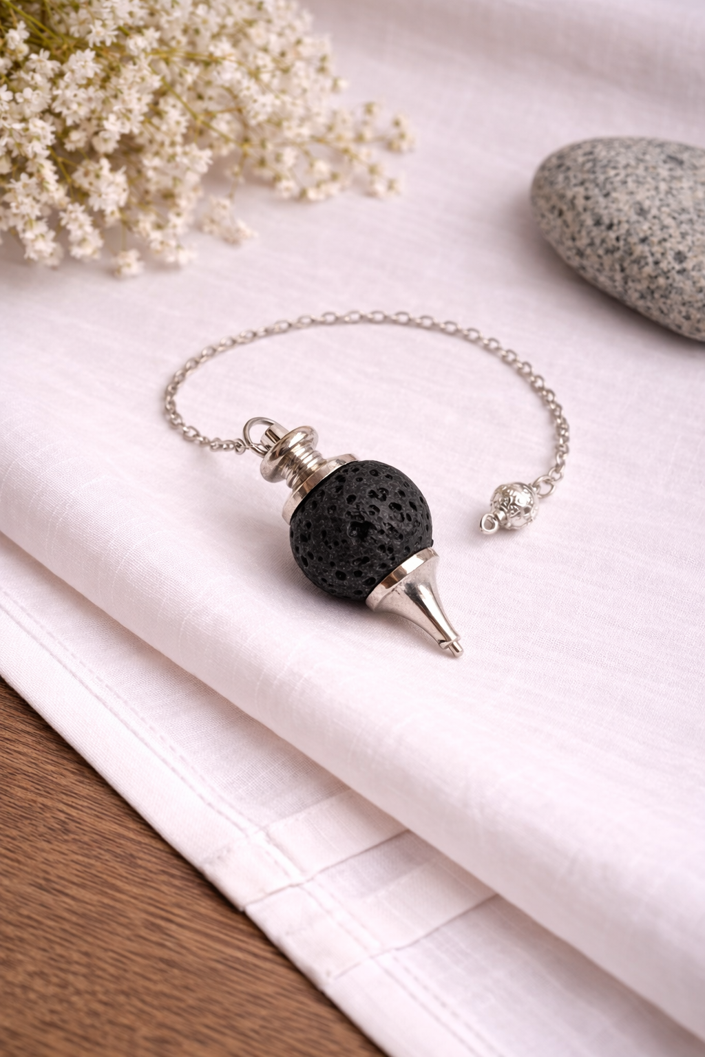 Pendule sphérique en pierre de lave